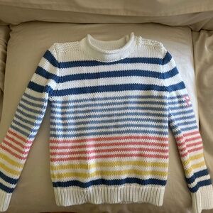 Little girl’s cable knit sweater
